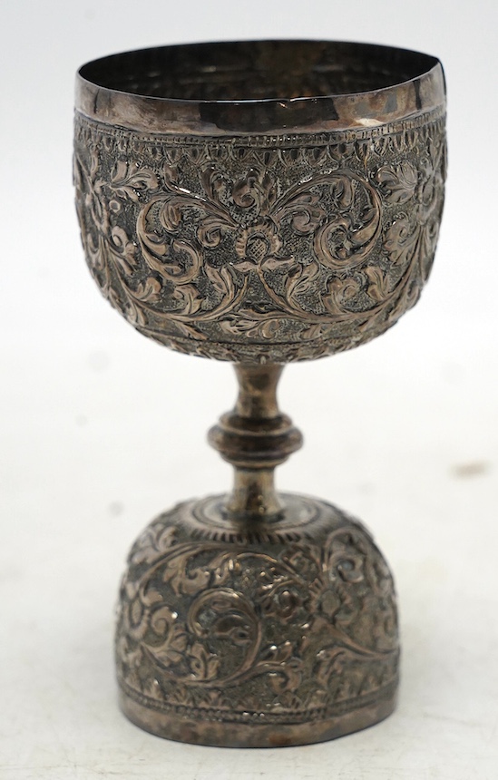 An Indian white metal double measure, 97mm, 87 grams. Condition - fair